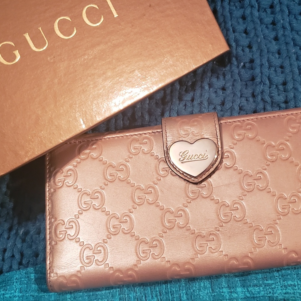 Rose gold Gucci clutch